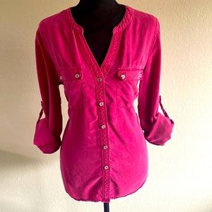 New York company, purple pink top.